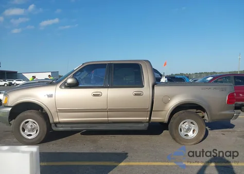 2001 Ford F150 Supercrew z USA, uszkodzony, nr VIN 1FTRW08L41KF96837